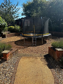 All done new stone and trampoline completed.